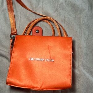 Brandon Blackwood “End systemic racism” Orange tote